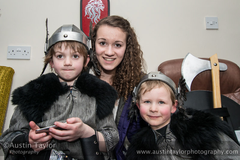 Andrew Lowe, Erin Lowe and Struan MacDonald - Jarl Squad visits the sheltered homes at Glebe Park - Bressay Up Helly-Aa 28 February 2014