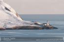 Winter view of Bressay and its lighthouse in the snow from Staneyhill, Lerwick